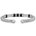 Black Caviar Two-Tone Five Station Black Ceramic Versa Torque Bracelet featuring sterling silver caviar beading, 18K gold accents, and five black ceramic stations.