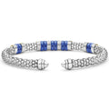 Blue Caviar Two-Tone Five Station Ultramarine Ceramic Versa Torque Bracelet with sterling silver caviar beading, ultramarine ceramic stations, and 18K gold accents for a sophisticated finish.