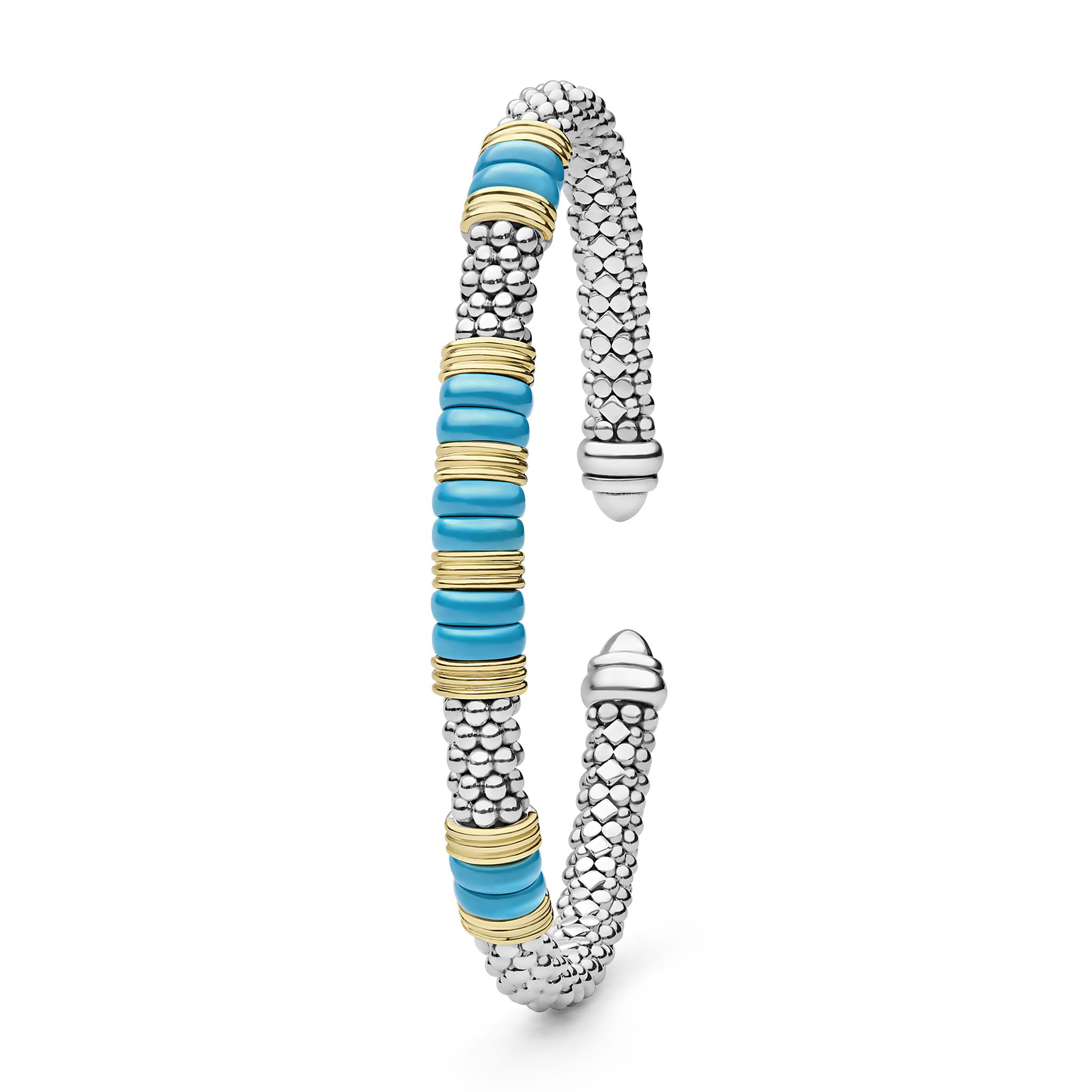 Blue Caviar Two-Tone Five Station Blue Ceramic Versa Torque Bracelet with sterling silver and 18K gold accents, featuring caviar beading and vibrant blue ceramic elements alongside a sleek design.