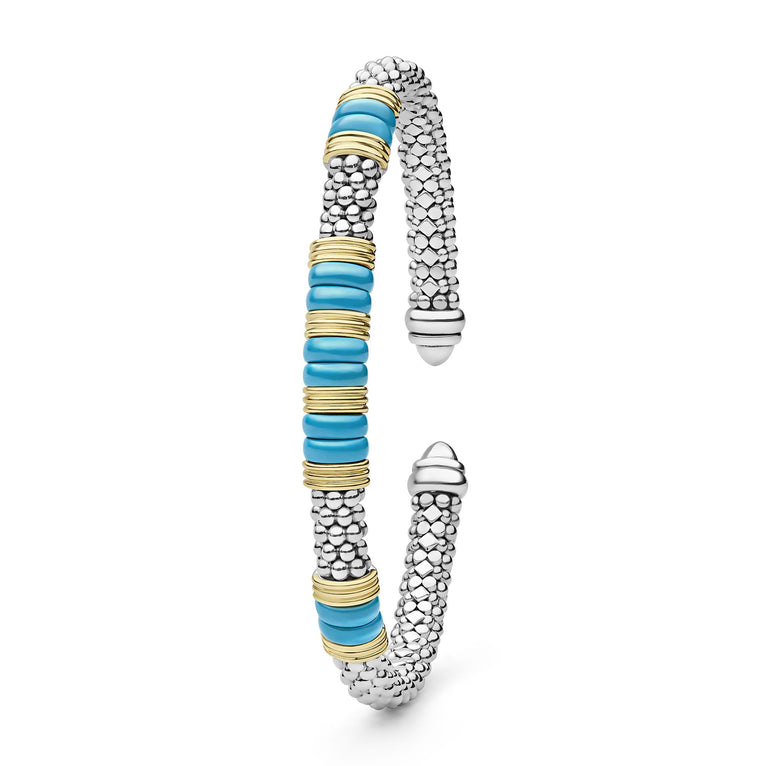 Blue Caviar Two-Tone Five Station Blue Ceramic Versa Torque Bracelet with sterling silver and 18K gold accents, featuring caviar beading and vibrant blue ceramic elements alongside a sleek design.