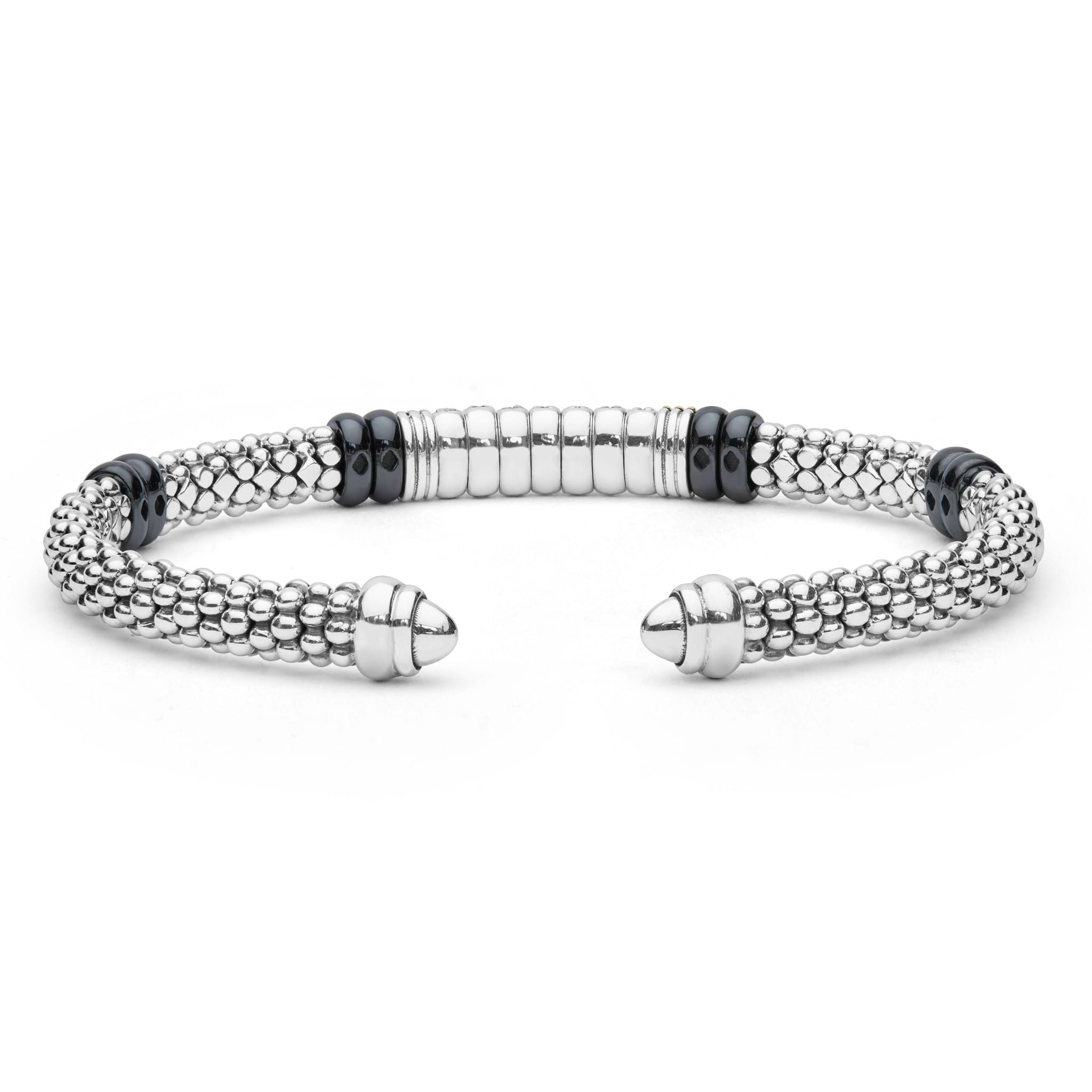 Black Caviar Two-Tone Diamond Station Black Ceramic Versa Torque Bracelet featuring sterling silver caviar beading, 18K gold accents, and a central diamond station with black ceramic highlights.