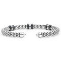  5mm features sterling silver caviar beading, 18K gold accents, and black ceramic on a modern open cuff.