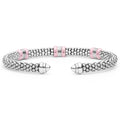 Pink Caviar Two-Tone Three Station Pink Ceramic Versa Torque Bracelet features polished sterling silver beading, 18K gold stations, and pink ceramic accents, showcasing open cuff elegance.
