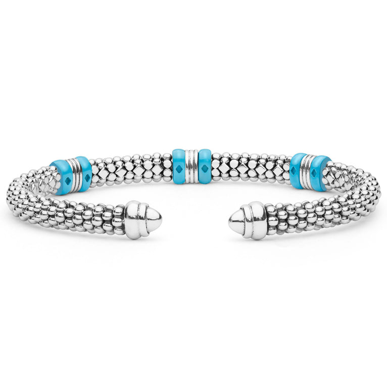 5mm featuring sterling silver caviar beading, 18K gold stations, and blue ceramic accents in a cuff design.