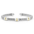 White Caviar Two-Tone Three Station White Ceramic Versa Torque Bracelet features sterling silver caviar beading, 18K gold stations, and white ceramic accents for a refined, sophisticated look.