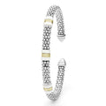 White Caviar Two-Tone Three Station White Ceramic Versa Torque Bracelet features sterling silver caviar beading, 18K gold stations, and white ceramic accents in an open cuff design.