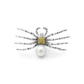 A LAGOS exclusive. Cultured freshwater pearl is the highlight of this spider pin crafted by 18K gold and sterling silver Caviar beading.