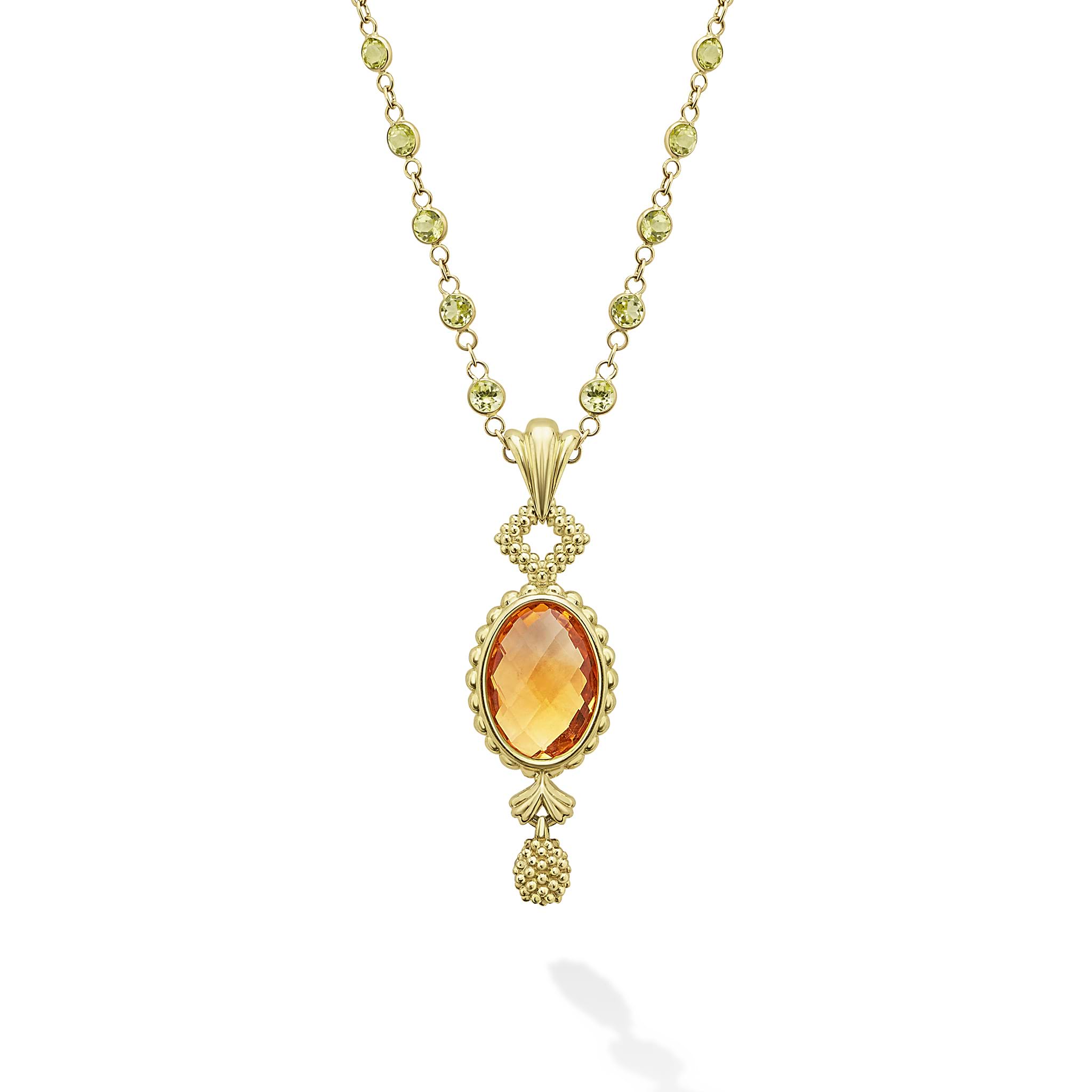 Showcasing an oval shaped Citrine pendant, encased in a delicately crafted 18k gold frame, this necklace features a series of light green gemstones faceted to enhance this necklace's vibrant glow.