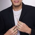 Man wearing 18k gold caviar jewelry