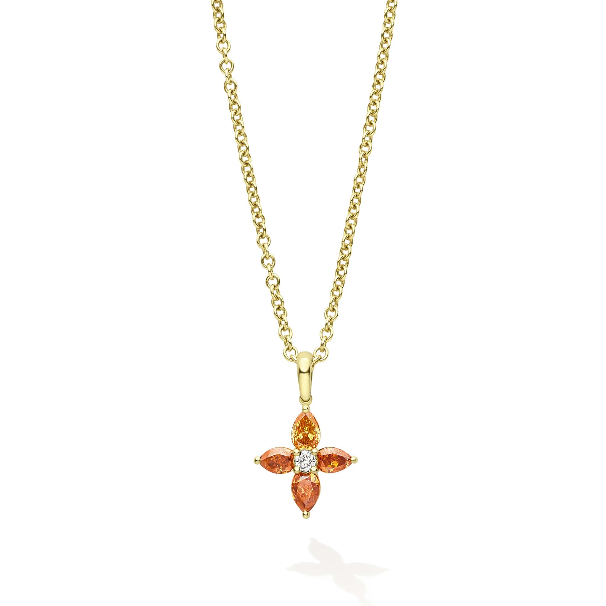 18K gold & orange pear mixed cut diamonds surround a round brilliant cut diamond.
