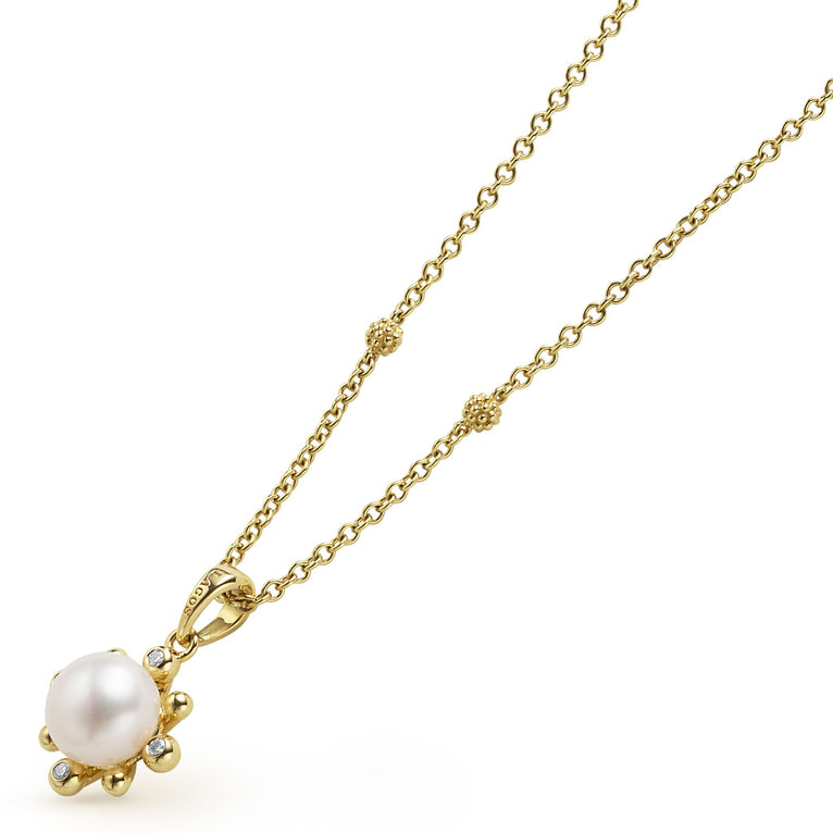 Side view of 18K Gold Fleur Pearl Diamond Pendant Necklace