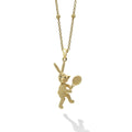 Artfully crafted 18K gold Caviar beaded rabbit pendant playing tennis. Accommodates most LAGOS chains.