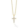 Gold cross pendant necklace on a white background