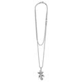 Silver necklace with a gecko pendant on a white background