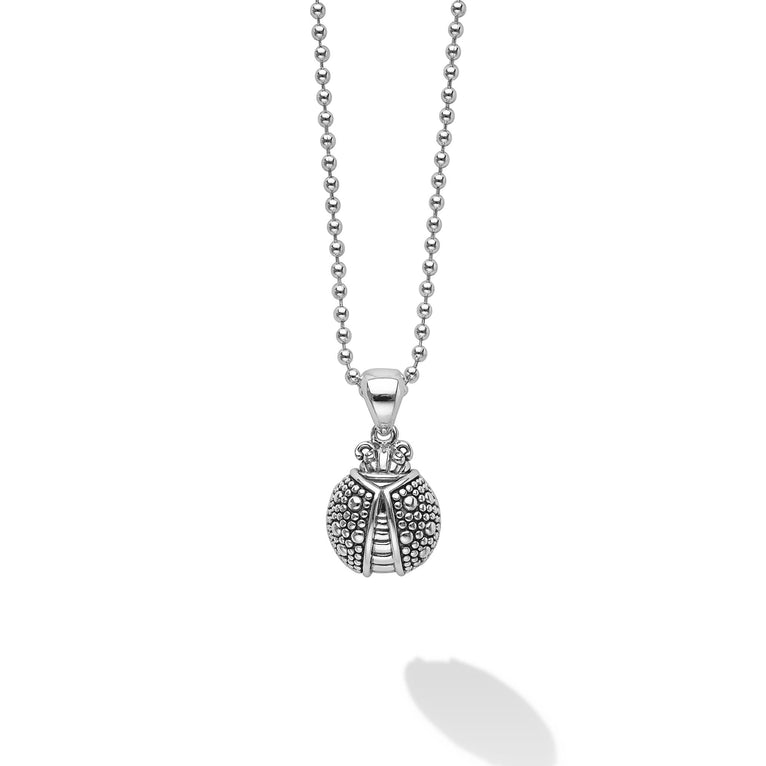 Rare Wonders Silver Ladybug Pendant Necklace featuring a sterling silver ladybug with intricate caviar beading on a ball-chain, reflecting LAGOS's dedication to elegance and craftsmanship.