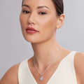 Woman wearing the Caviar Spark Medium Sterling Silver Diamond Pendant Necklace, showcasing a pavé diamond pendant with sterling silver Caviar beading and link chain.