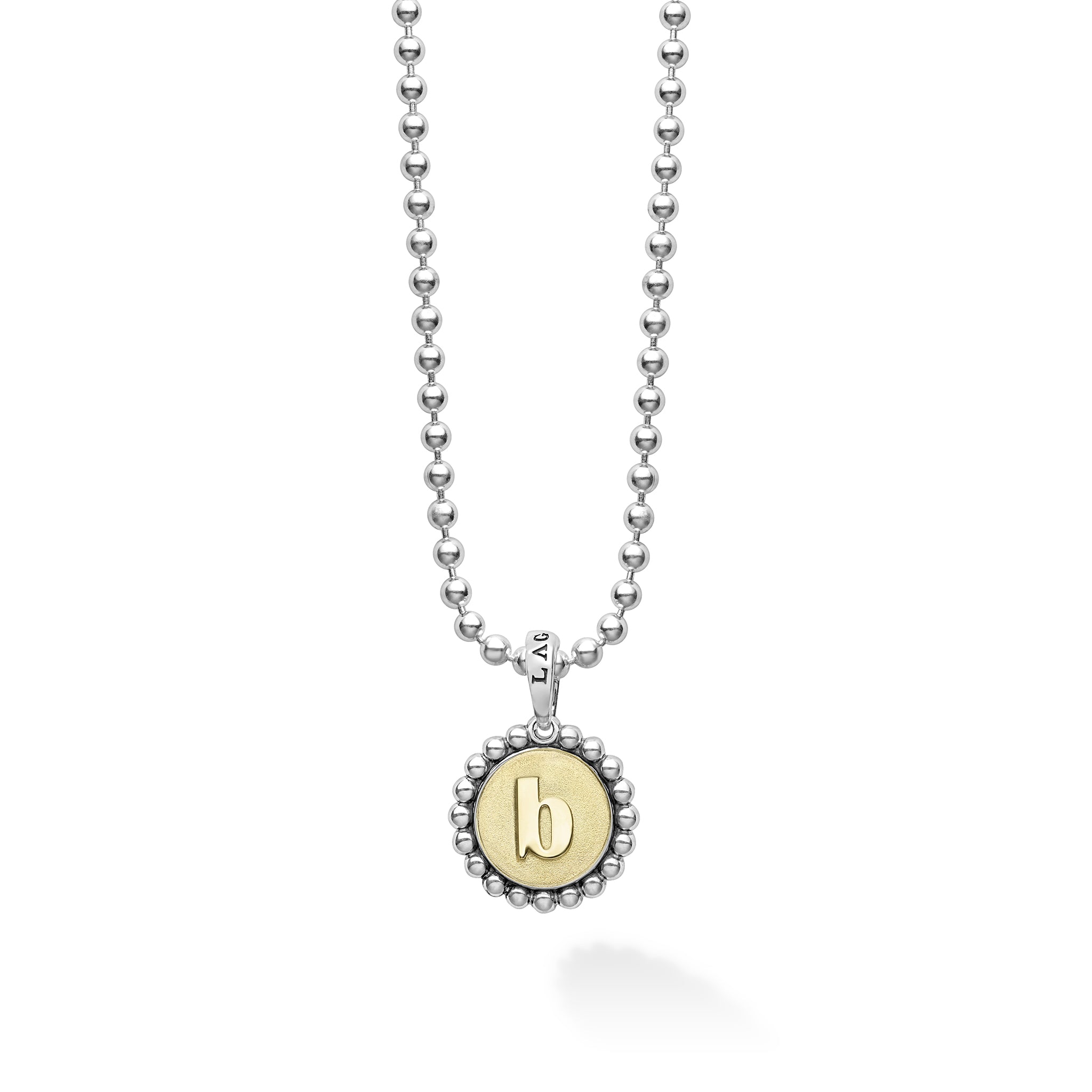 Signature Caviar B Initial Charm Necklace with a sterling silver ball chain and a two-tone pendant, featuring an embossed 18K gold “b” framed by caviar beading.