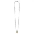 Signature Caviar B Initial Charm Necklace in sterling silver with an 18K gold center, featuring caviar beading and a sleek ball chain by LAGOS.