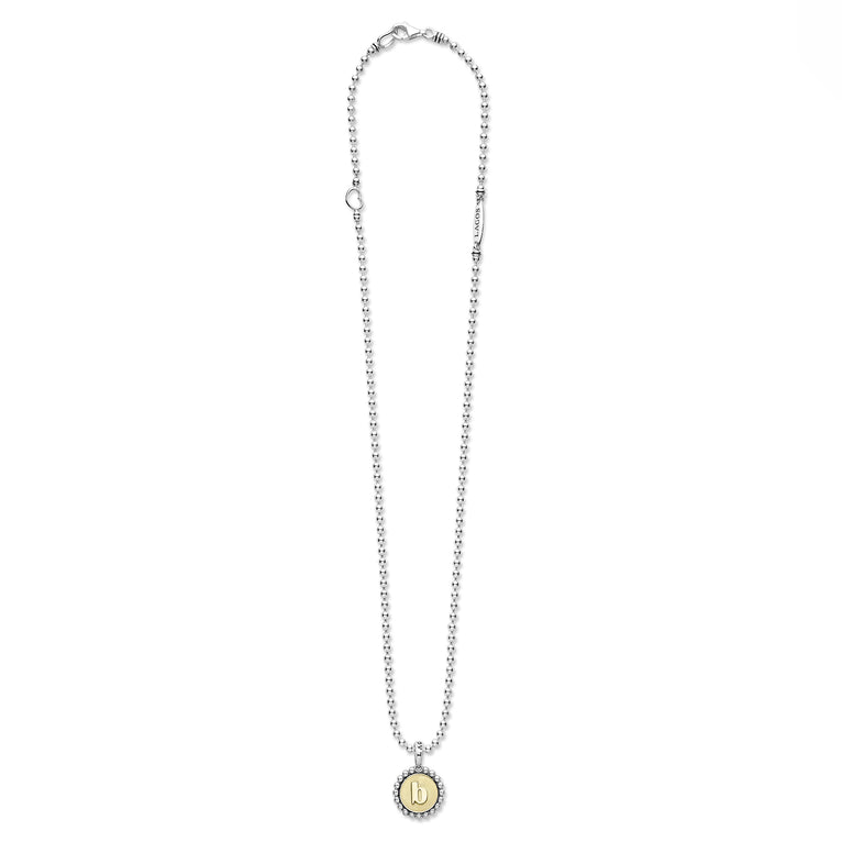 Signature Caviar B Initial Charm Necklace in sterling silver with an 18K gold center, featuring caviar beading and a sleek ball chain by LAGOS.