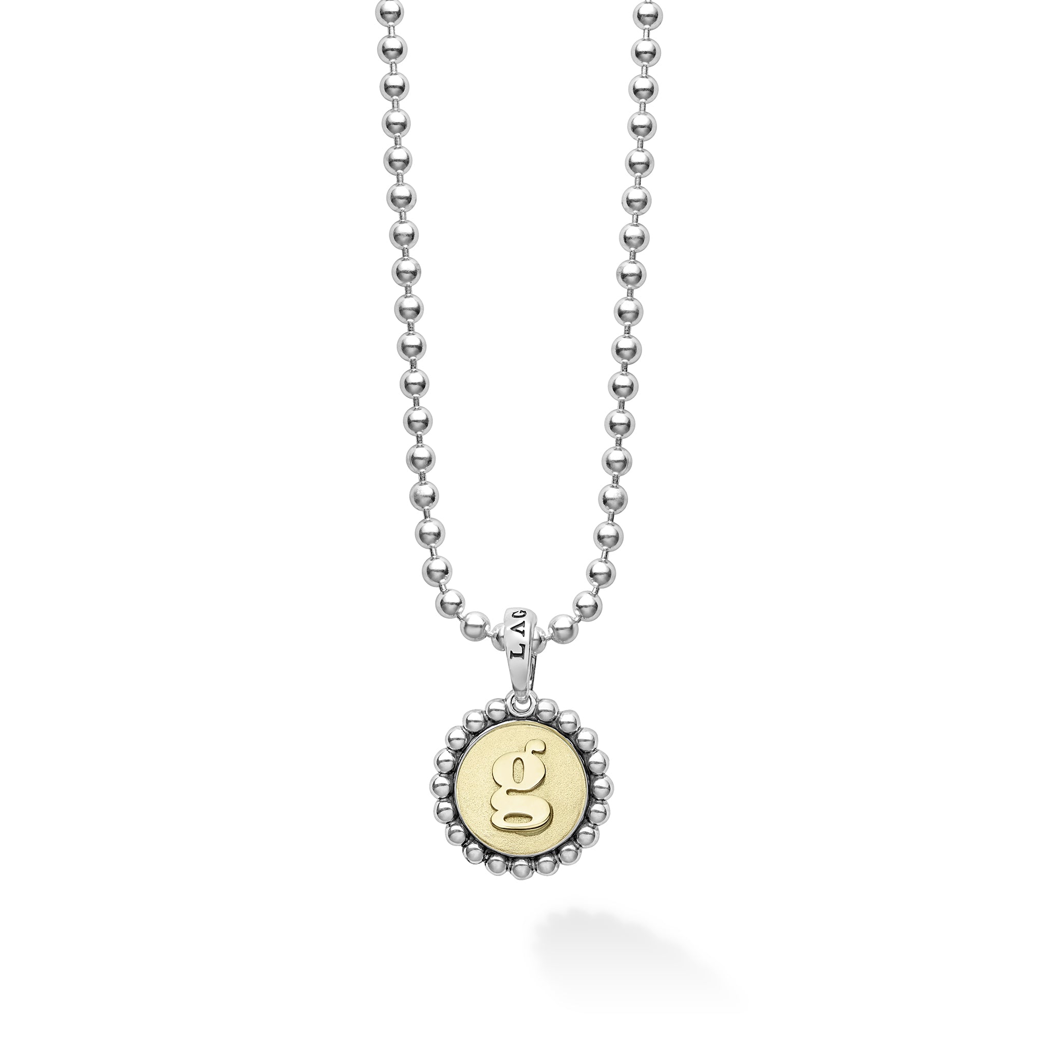 Our Signature Caviar sterling silver and 18K gold initial 'G' charm finished on a sterling silver ball chain necklace.