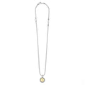Signature Caviar I Initial Charm Necklace: sterling silver ball chain with an 18K gold disc pendant, featuring an embossed “i” and caviar beading border.