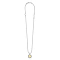 Signature Caviar L Initial Charm Necklace featuring a sterling silver ball chain, caviar beading, and a two-tone pendant with an 18K gold I initial and heart accent.