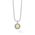 Signature Caviar N Initial Charm Necklace featuring a sterling silver ball chain and a round pendant with 18K gold N initial, accented by caviar beading.