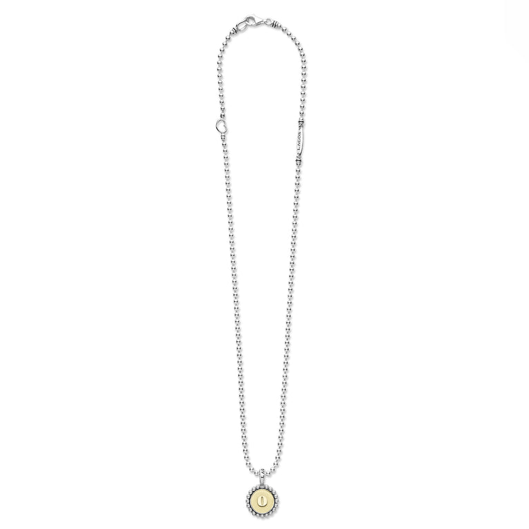 Signature Caviar O Initial Charm Necklace by Lagos, featuring sterling silver beads, 18K gold medallion with O engraving, and caviar beading, secured with lobster-claw clasp.