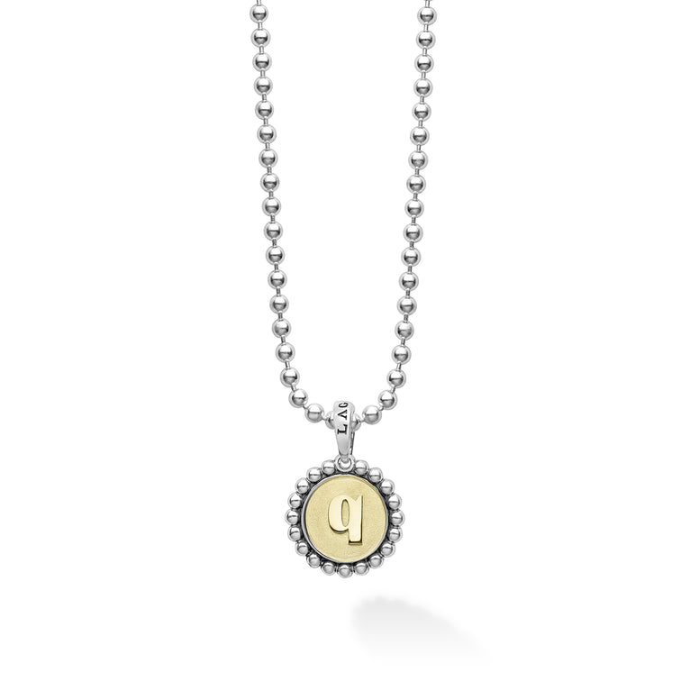 Our Signature Caviar sterling silver and 18K gold initial 'Q' charm finished on a sterling silver ball chain necklace.