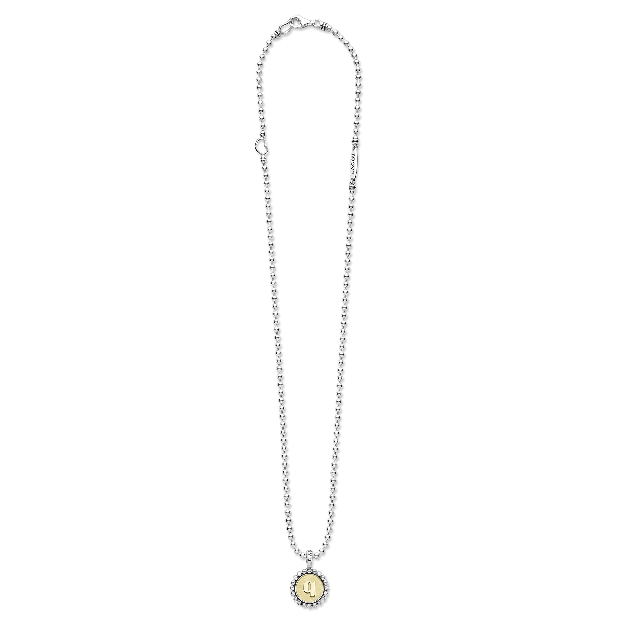 Signature Caviar Q Initial Charm Necklace with sterling silver ball chain, caviar-beaded bezel, and 18K gold disc pendant stamped with “Q.”