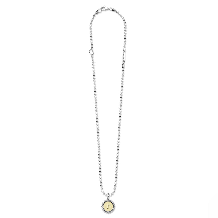 Signature Caviar R Initial Charm Necklace with sterling silver bead chain, 18K gold disc with “r” initial, and lobster-claw clasp. Elegant LAGOS craftsmanship.