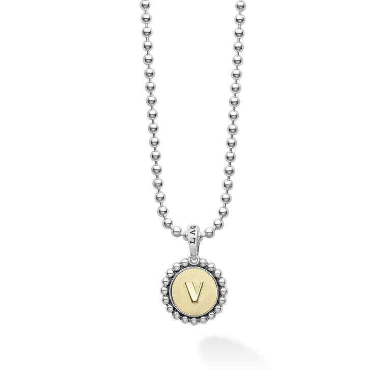 Our Signature Caviar sterling silver and 18K gold initial 'V' charm finished on a sterling silver ball chain necklace.