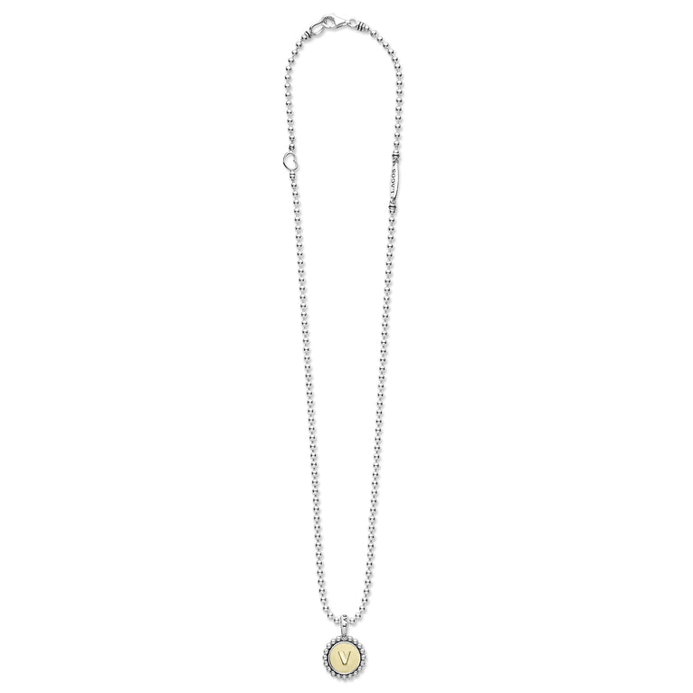 Signature Caviar V Initial Charm Necklace featuring a sterling silver chain, 18K gold V charm with caviar beading, and a LAGOS engraved tag.