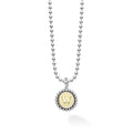 Our Signature Caviar sterling silver and 18K gold initial 'W' charm finished on a sterling silver ball chain necklace.