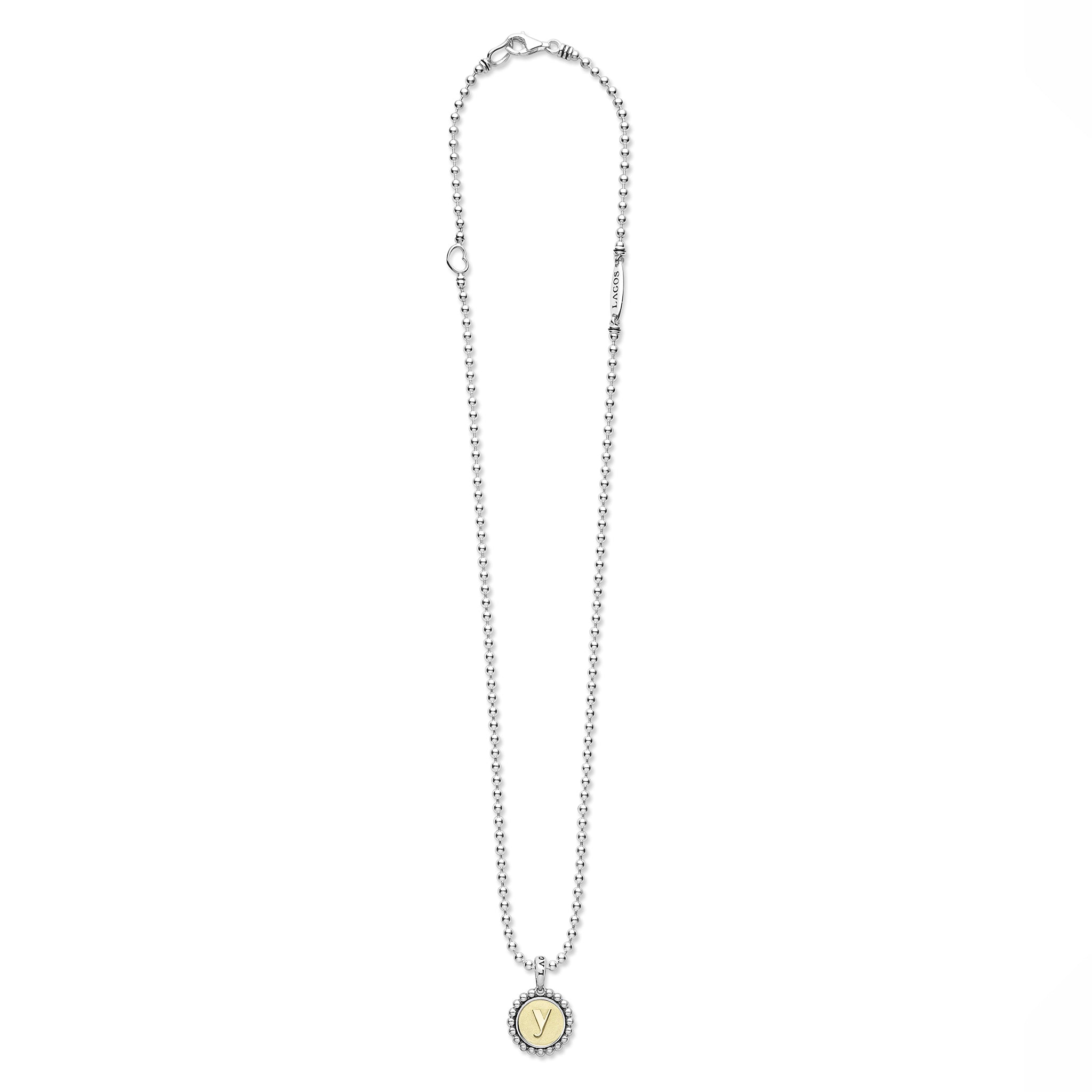 Signature Caviar Y Initial Charm Necklace featuring sterling silver beads, an 18K gold-engraved Y pendant, and LAGOS's signature caviar beading on a fine chain.