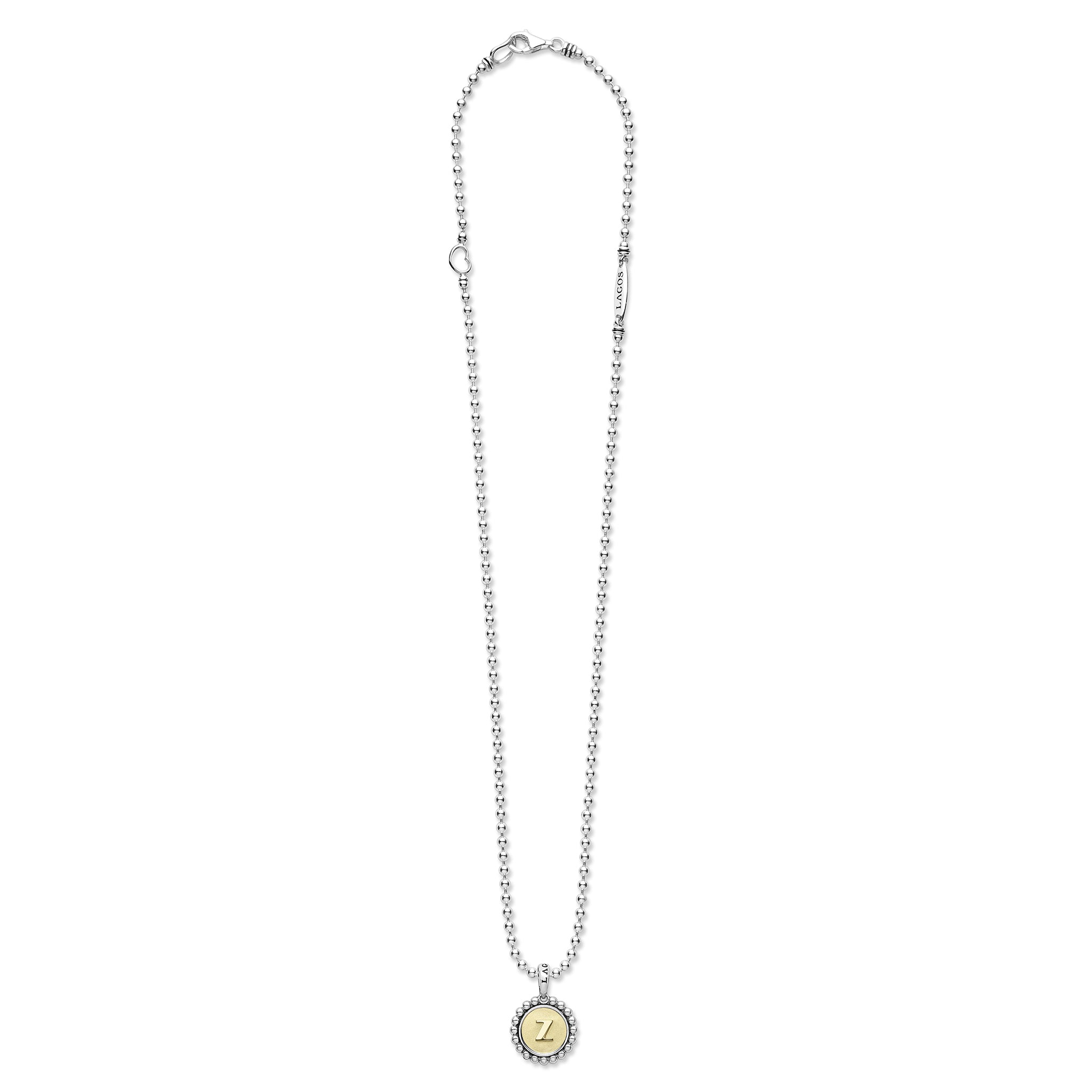 Signature Caviar Z Initial Charm Necklace features a sterling silver beaded chain with an 18K gold initial pendant, accented by an open heart and “LAGOS” tag.