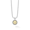 Our Signature Caviar sterling silver and 18K gold Capricorn charm finished on a sterling silver ball chain necklace. This zodiac charm represents birthdays from December 22 to January 19.