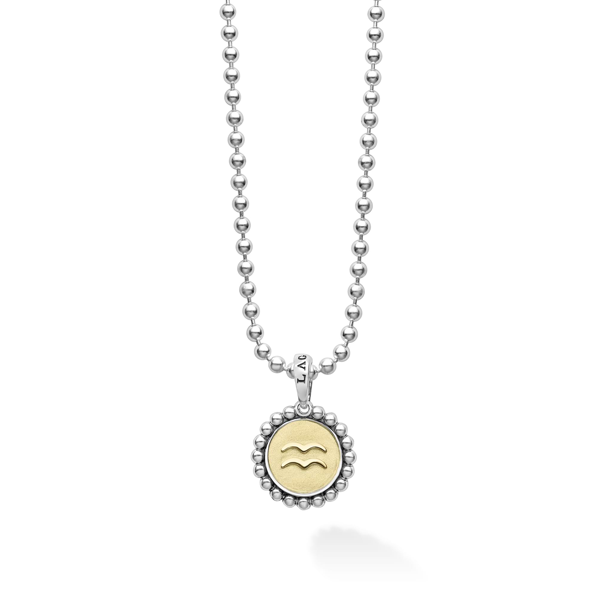 Our Signature Caviar sterling silver and 18K gold Aquarius charm finished on a sterling silver ball chain necklace. This zodiac charm represents birthdays from January 20 to February 18.