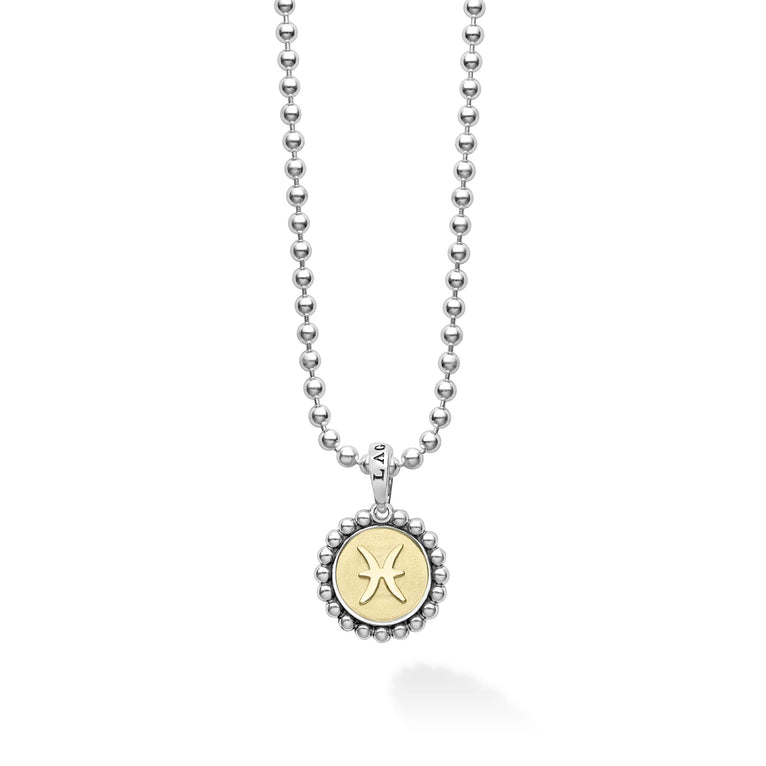 Our Signature Caviar sterling silver and 18K gold Pisces charm finished on a sterling silver ball chain necklace. This zodiac charm represents birthdays from February 19 to March 20.