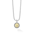 Our Signature Caviar sterling silver and 18K gold Taurus charm finished on a sterling silver ball chain necklace. This zodiac charm represents birthdays from April 20 to May 20.
