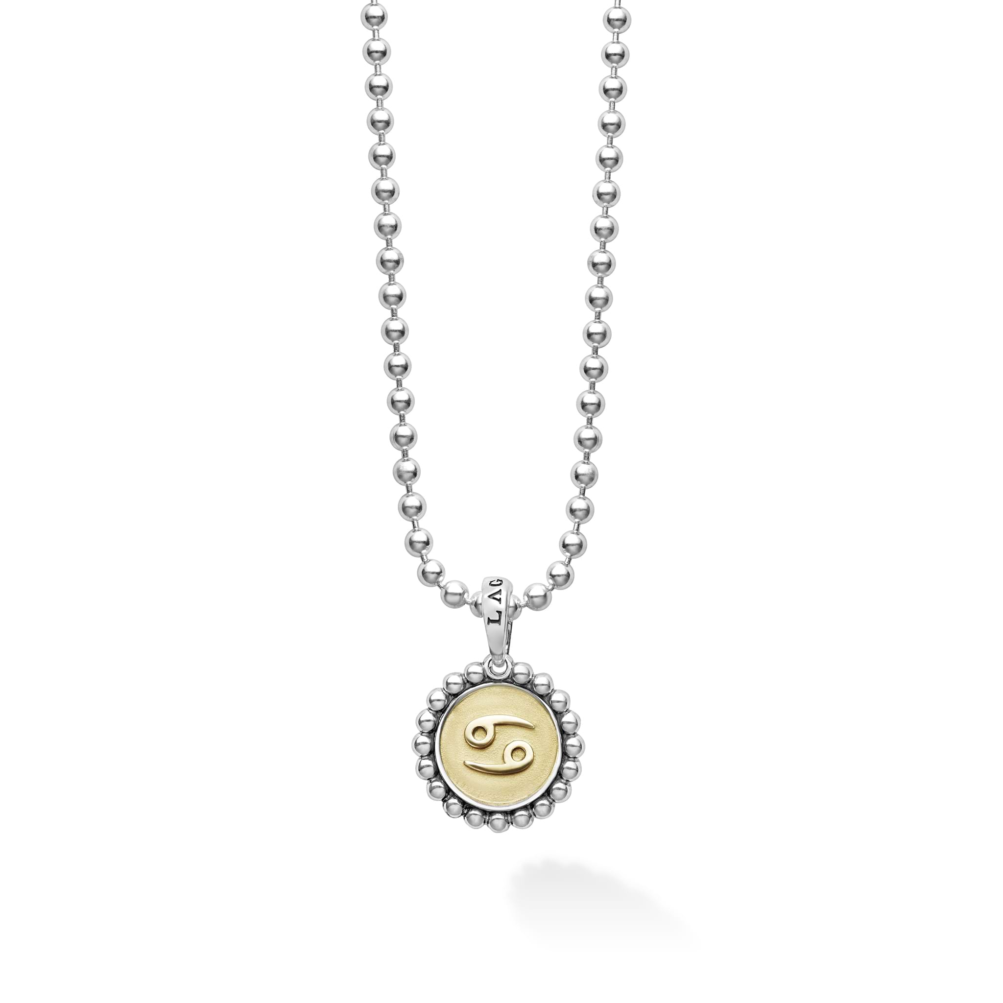 Our Signature Caviar sterling silver and 18K gold Cancer charm finished on a sterling silver ball chain necklace. This zodiac charm represents birthdays from June 21 to July 22.