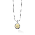 Our Signature Caviar sterling silver and 18K gold Leo charm finished on a sterling silver ball chain necklace. This zodiac charm represents birthdays from July 23 to August 22.