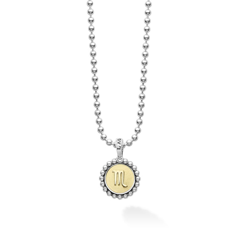 Our Signature Caviar sterling silver and 18K gold Scorpio charm finished on a sterling silver ball chain necklace. This zodiac charm represents birthdays from October 23 to November 21.