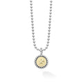 Our Signature Caviar sterling silver and 18K gold Sagittarius charm finished on a sterling silver ball chain necklace. This zodiac charm represents birthdays from November 22 to December 21.