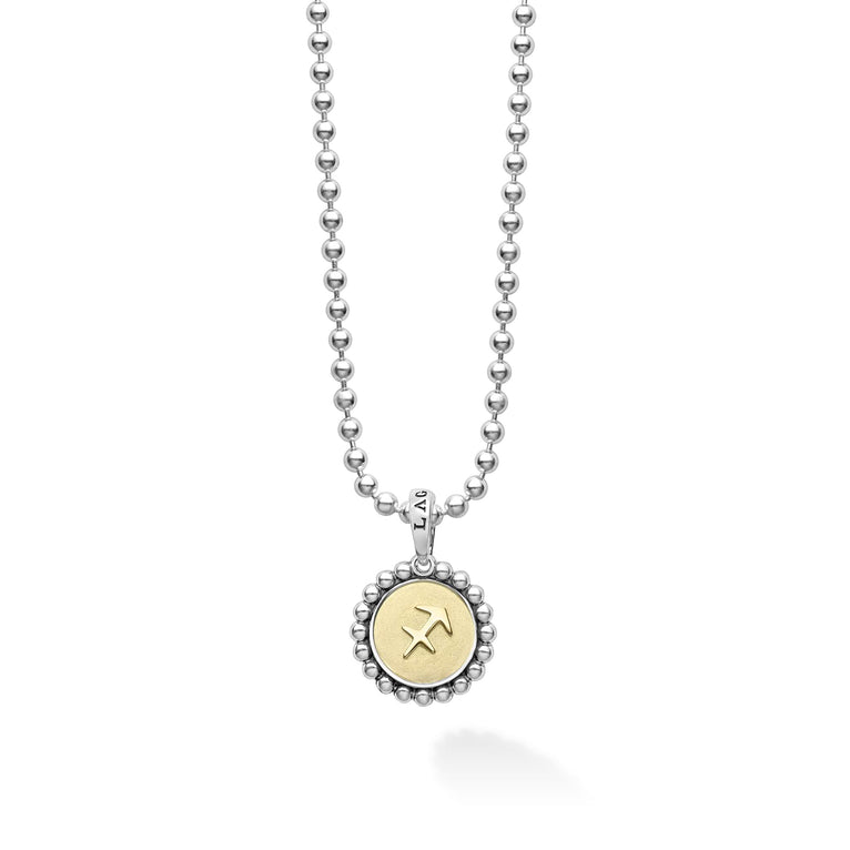 Our Signature Caviar sterling silver and 18K gold Sagittarius charm finished on a sterling silver ball chain necklace. This zodiac charm represents birthdays from November 22 to December 21.