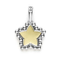 A Signature Caviar sterling silver and 18K gold star charm. Charm can only be paired with chains 04-80756-ML, 04-80549-ML, 04-80946-ML or 04-10534-ML. Chain sold separately.