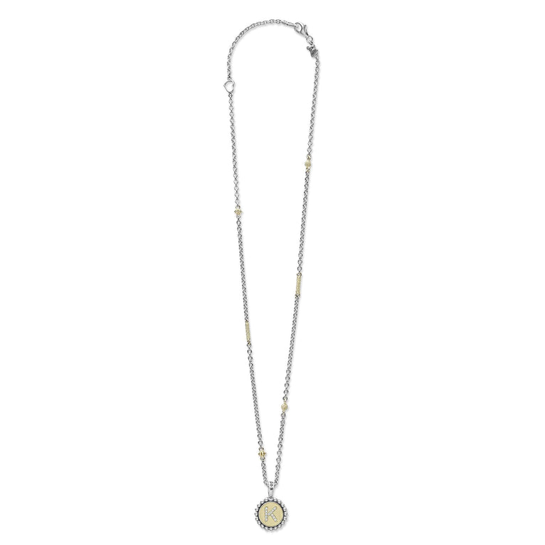 Signature Caviar K Initial Diamond Charm Necklace with sterling silver, 18K gold accents, a K initial charm on a caviar beaded chain, showcasing elegant craftsmanship.