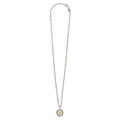 Signature Caviar V Initial Diamond Charm Necklace: sterling silver chain with 18K gold bead accents, V pavé stone pendant, showcasing LAGOS' elegant craftsmanship.