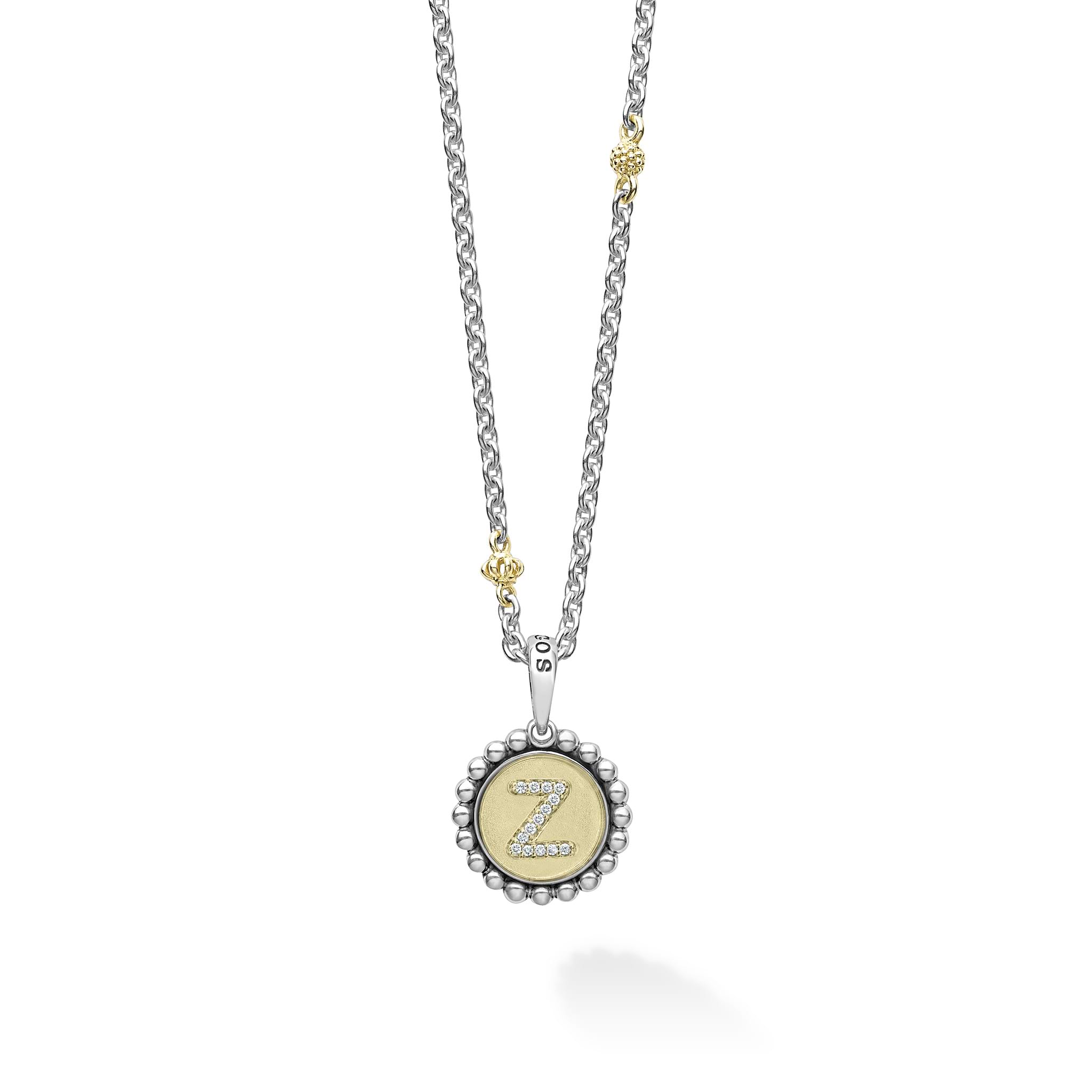 Our Signature Caviar sterling silver and 18K gold initial 'Z' diamond charm finished on a sterling silver and 18K gold Caviar beaded necklace.