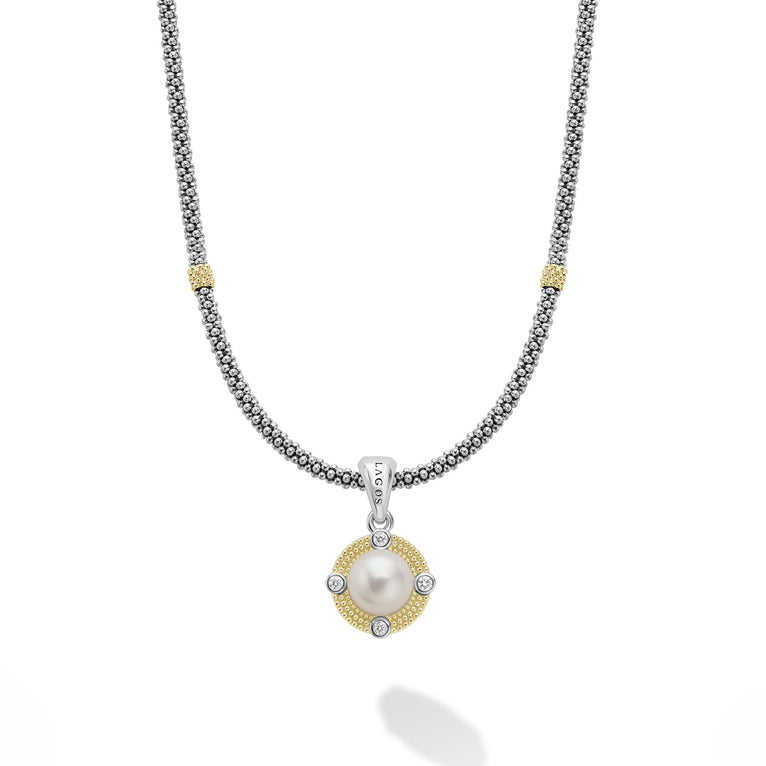 A freshwater cultured pearl surrounded by diamonds and smooth sterling silver Caviar beading and 18K gold stations forms this necklace. LAGOS diamonds are the highest quality natural stones. Length offered in 16 inches and 18 inches.